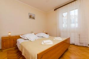Postel nebo postele na pokoji v ubytování Apartment Antonija