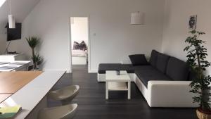 Posedenie v ubytovaní Rozmaring Apartman Pécs