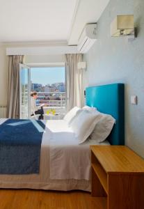 Postel nebo postele na pokoji v ubytování Hotel D. Dinis