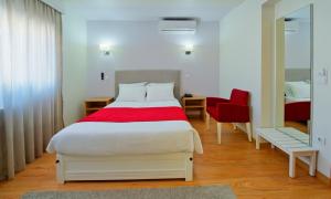 Postel nebo postele na pokoji v ubytování Hotel D. Dinis