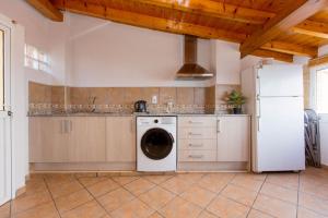 A kitchen or kitchenette at Villa EGO