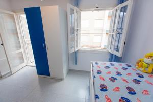 A bed or beds in a room at Villa EGO
