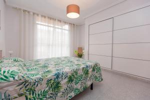 A bed or beds in a room at Villa EGO