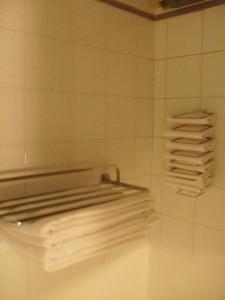 Kylpyhuone majoituspaikassa Hotel Des Alpes