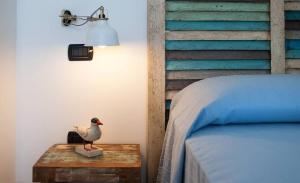 A bed or beds in a room at Casa Serradei