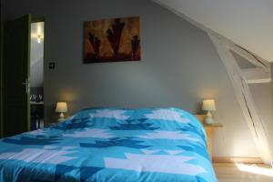 Katil atau katil-katil dalam bilik di La Grange du tardenois en champagne