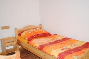Postel nebo postele na pokoji v ubytování Roubenka-Mila