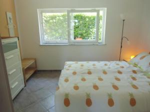 Postel nebo postele na pokoji v ubytování Apartment Kolman