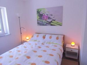 Postel nebo postele na pokoji v ubytování Apartment Kolman