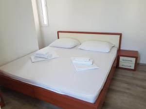 Postel nebo postele na pokoji v ubytování Apartments Vinko