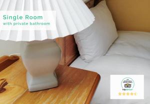 Letto o letti in una camera di Aras Ghleann Cholm Cille