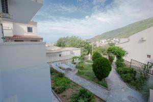 a view from the balcony of a house at Valentina Apartman in Petrovac na Moru