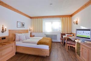 Ein Bett oder Betten in einem Zimmer der Unterkunft Apart Faldershof