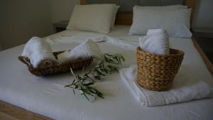 Postel nebo postele na pokoji v ubytování Hotel Ionian
