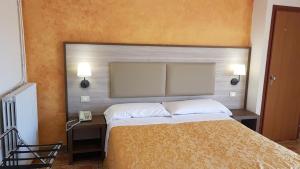 Postel nebo postele na pokoji v ubytování Aparthotel Amelia Dream View