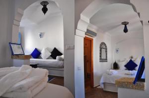 Llit o llits en una habitació de Hotel Al Alba Hammam & Restaurant