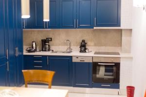 A kitchen or kitchenette at Abi Luxury Villas