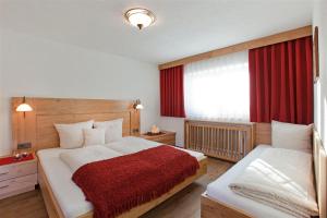 Ein Bett oder Betten in einem Zimmer der Unterkunft Apart Faldershof