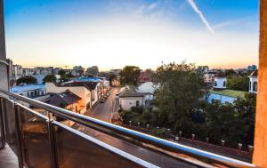 a view of a city from a balcony at Dreamtime Apartments in Bucharest