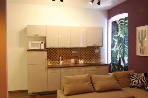 Kuchyň nebo kuchyňský kout v ubytování Cozy apartment in center of Rijeka