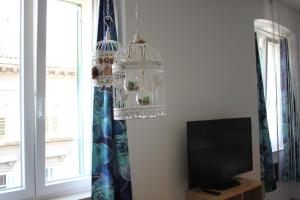 TV a/nebo společenská místnost v ubytování Cozy apartment in center of Rijeka