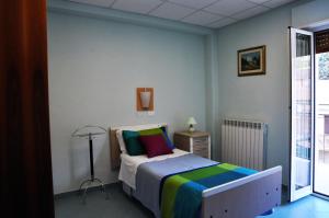 Postel nebo postele na pokoji v ubytování Albergo Rio