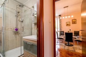 Koupelna v ubytování Apartment Savin + 70 fotografií