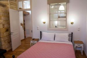 Postel nebo postele na pokoji v ubytování Green Door Apartment