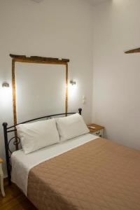 Postel nebo postele na pokoji v ubytování Green Door Apartment
