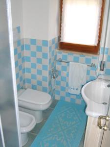Koupelna v ubytování Casa sulla spiaggia