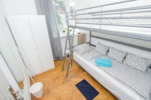Postel nebo postele na pokoji v ubytování UWH Hostel