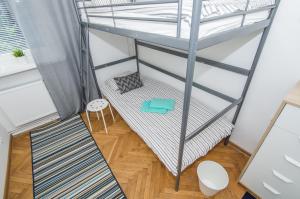 Postel nebo postele na pokoji v ubytování UWH Hostel