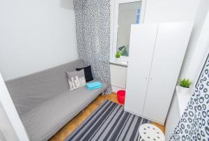 Postel nebo postele na pokoji v ubytování UWH Hostel