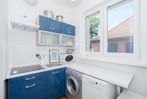 Kuchyň nebo kuchyňský kout v ubytování UWH Hostel