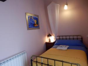 Postel nebo postele na pokoji v ubytování Casa Candana