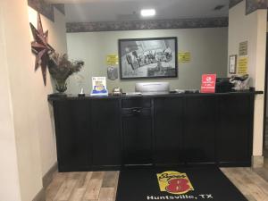 Vstupní hala nebo recepce v ubytování Super 8 by Wyndham Huntsville + 24 fotografií