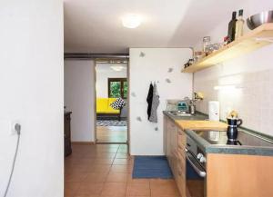 a kitchen with a sink and a counter top at Mediterranean Family design in Izola +11 photos