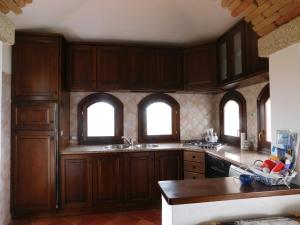 Virtuvė arba virtuvėlė apgyvendinimo įstaigoje la casa della tartaruga