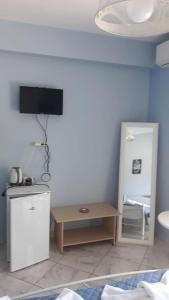 TV a/nebo společenská místnost v ubytování Olympic View Guesthouse
