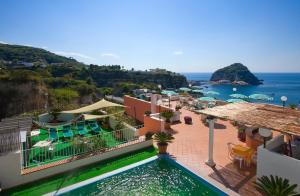 an aerial view of a resort with the ocean at Hotel Residence S.Angelo in Ischia