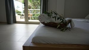 Postel nebo postele na pokoji v ubytování Hotel Ionian