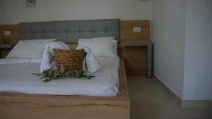Postel nebo postele na pokoji v ubytování Hotel Ionian