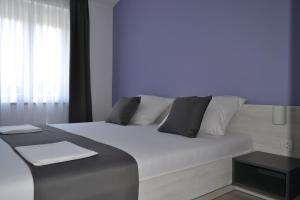 Posteľ alebo postele v izbe v ubytovaní VILLA ŠUŠANJ 1