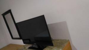 A television and/or entertainment centre at Asia Novo Boutique Hotel - Daet