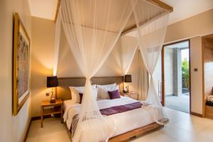 Letto o letti in una camera di Ulun Ubud Resort - CHSE Certified