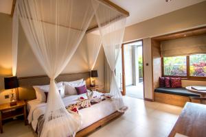 Letto o letti in una camera di Ulun Ubud Resort - CHSE Certified