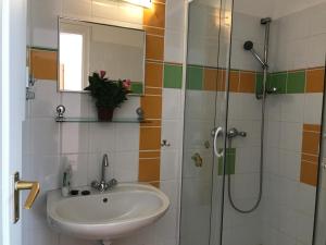 Kúpeľňa v ubytovaní Elvira Apartman + 20 fotografií