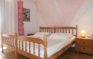 En eller flere senge i et værelse på Villa Na More