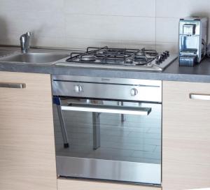 Kuchyň nebo kuchyňský kout v ubytování Residenze Roscioli