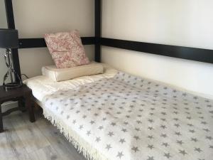 Postel nebo postele na pokoji v ubytování Spotsleeping